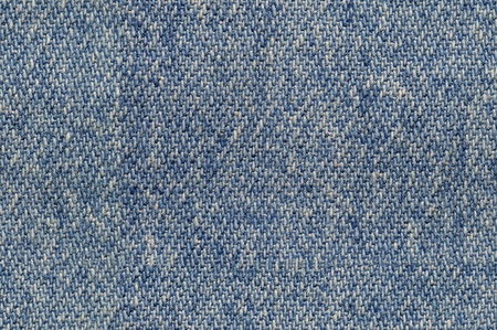 Blue denim cloth fabric background seamlessly tileableの写真素材