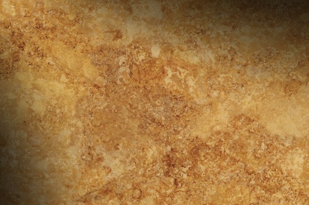 Brown mottled background surface texture lit diagonallyの写真素材