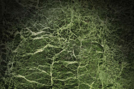 Green marble surface background lit from aboveの写真素材