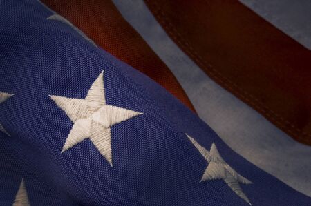 Closeup of a star stitched on an America Flagの写真素材