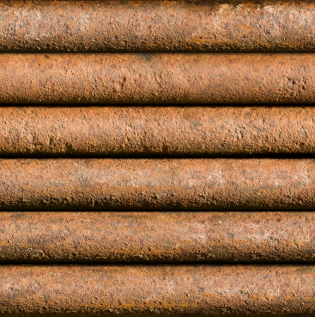 Horizontal rusty pipe background texture seamlessly tileableの写真素材