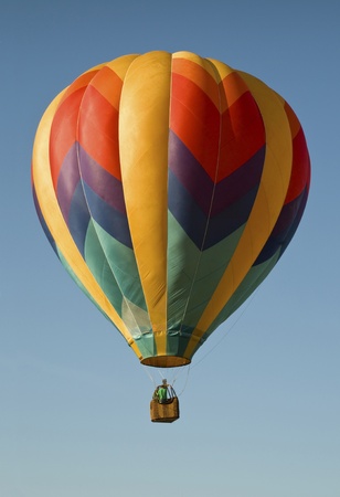 Hot-air balloon against a blue skyの写真素材