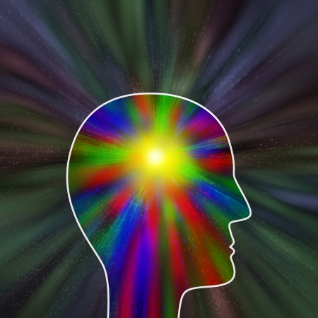 Colorful explosion of thought or pain as suggested by the head profileの写真素材