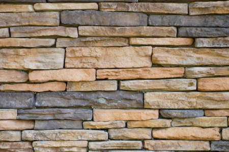 Yellow and Gray Masonry Wall Backgroundの写真素材