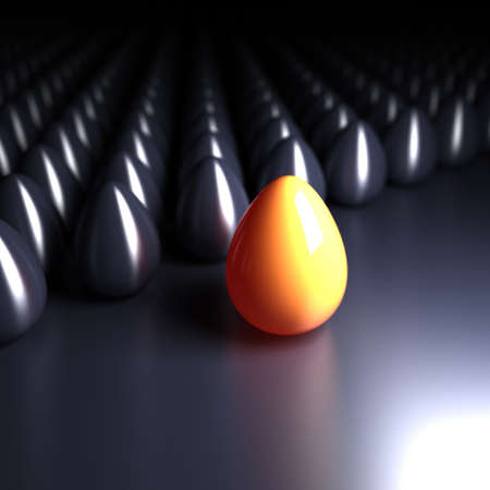 Bright egg ahead of dark eggs. Conception of innovationの写真素材