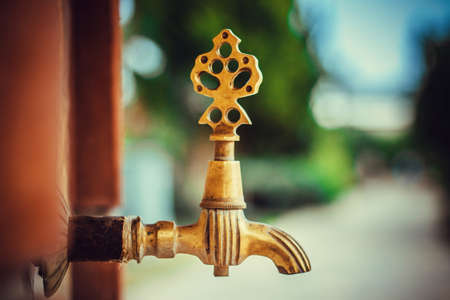 Golden samovar tap  Photo with DOF