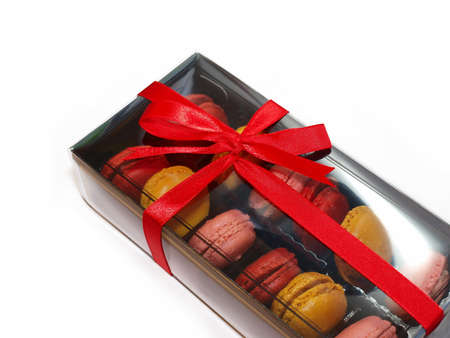 Macarons in gift box with red ribbonの写真素材