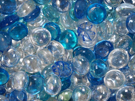 Blue and transparent glass marbles   の写真素材