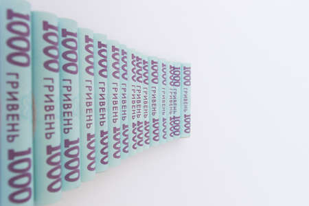 Ukrainian money. 1000 hrivnia banknotes on a white with copy space.の写真素材