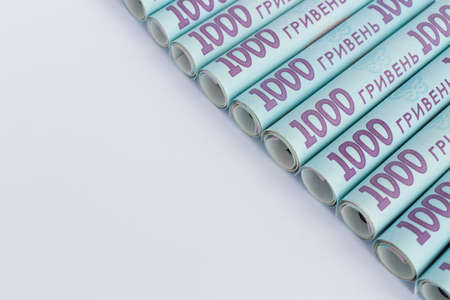 Ukrainian money. Hryvnia background. On a white with copy space.の写真素材