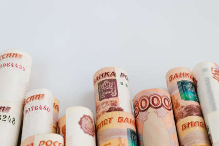 Rolled Russian money on a white background with a copy space. 5000 banknotes.の写真素材