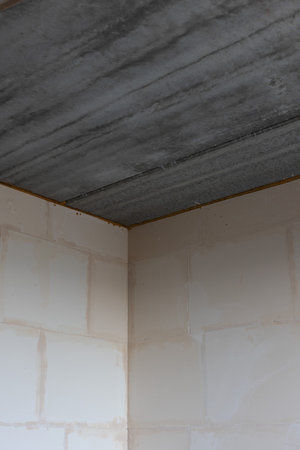 Ceiling from concrete slabs in a new unfinished apartment.の写真素材