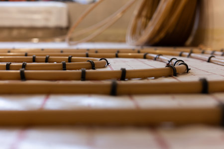 Underfloor water heating system. Closeup, selective focus.の写真素材