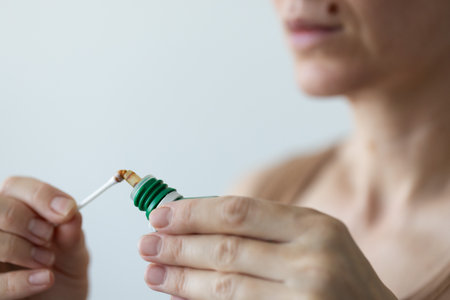 Treatment of wounds after removal of the moles with Closeup.の写真素材