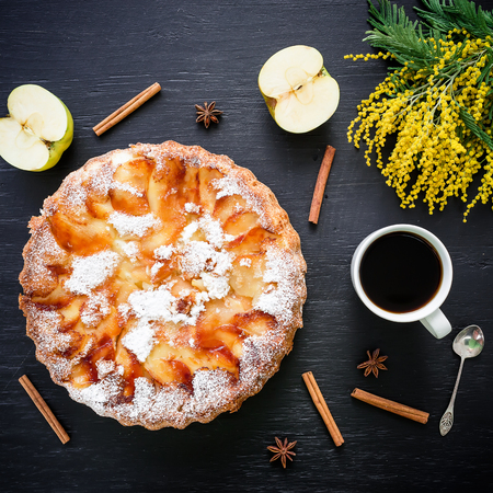 Apple cake, apple fruit and coffee cup on dark background. Flat lay, Top view. Food backgroundの写真素材