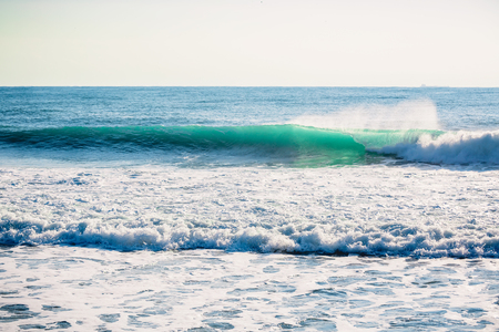 Blue crashing wave in ocean. Crystal wave in Baliの写真素材