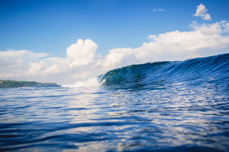 Blue ocean and ideal wave in Bali, Bingin beachの写真素材