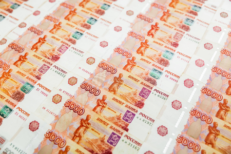 Russian paper banknote 5000 rubles background. Flat lay, top view