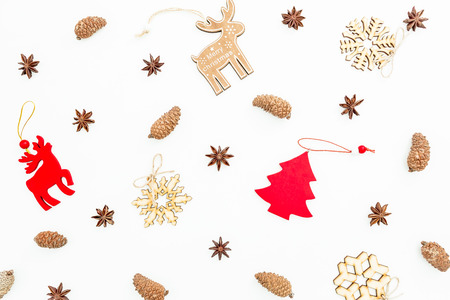 Christmas still life with decoration, snowflakes and pine cones isolated on white background. Flat lay, top view. Holiday concept.の写真素材