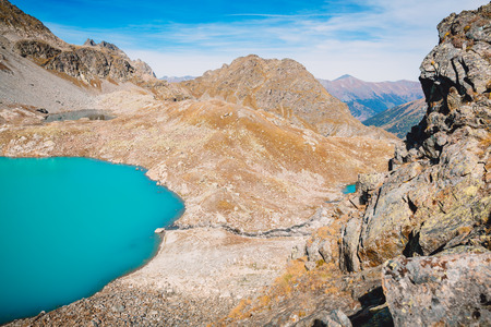 Mountain landscape with lake and peaks. View of mountain blue lake