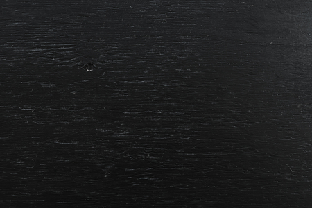 A wooden texture of painted wood. Black texture. Flat lay.の写真素材