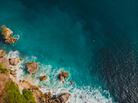 Aerial view of the island and the blue ocean in Bali, Indonesia.の写真素材