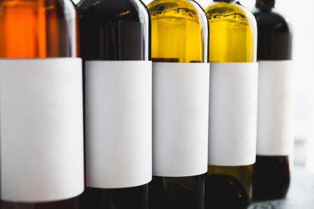 Assorted wine drinks in bottles. Alcoholic luxury drinks in restaurantの写真素材
