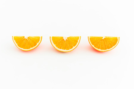 Slice of citrus fruits isolated on white background. Flat lay. Top viewの写真素材