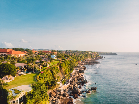 Aerial view rocky shore and ocean. Drone shot in Baliの写真素材