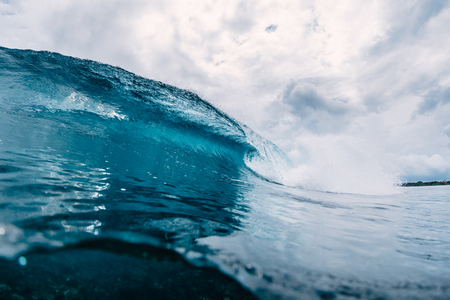 Big blue wave in ocean. Breaking wave in Oahuの写真素材
