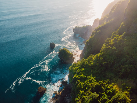 Amazing cliff, rocks and blue ocean in Bali.の写真素材
