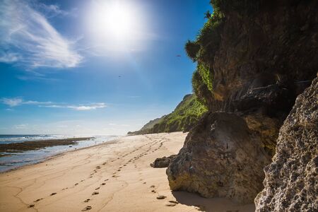 Tropical beach with ocean, sky and sunshine in Baliの写真素材