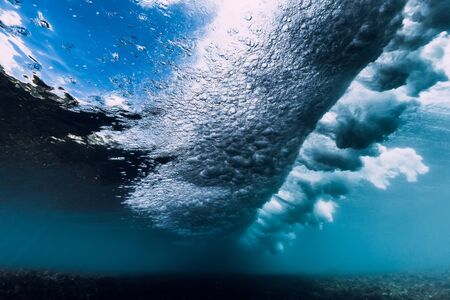 Breaking wave with vortex in underwater. Ocean element in underwater