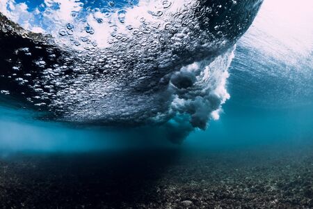 Breaking wave with vortex in underwater. Ocean element in underwater