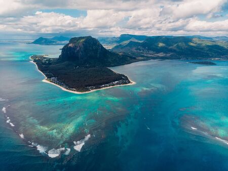 Tropical island with Le Morne mountain, ocean and beach in Mauritius. Aerial viewの写真素材