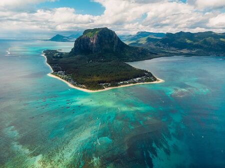 Tropical island with Le Morne mountain, ocean and beach in Mauritius. Aerial viewの写真素材