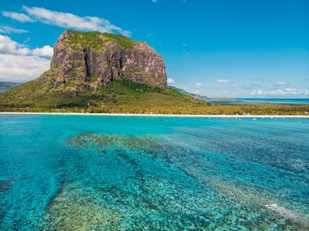 Tropical island with Le Morne mountain, ocean and beach in Mauritius. Aerial viewの写真素材