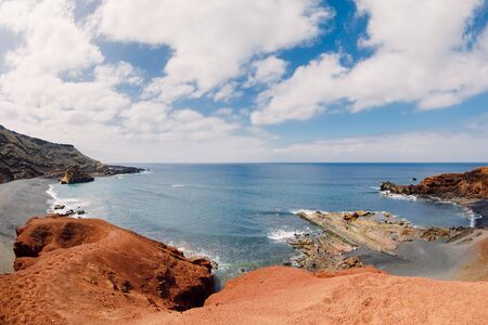 Beach and ocean near El Golfo, Lanzarote, Spain.の写真素材