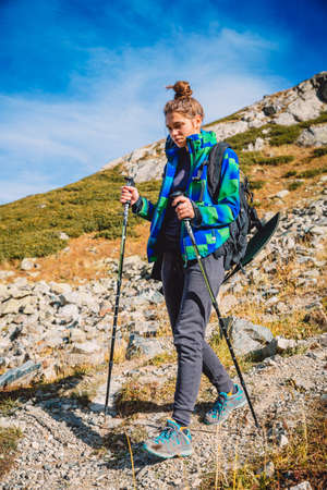 Octomber 07, 2019. Arkhyz, Russia. Hiker woman walk in the mountains.のeditorial素材