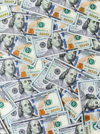 Texture US dollars. Background of one hundred dollar bills.