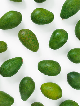 Avocado pattern on white background. Flat lay, top view. Food concept.の写真素材