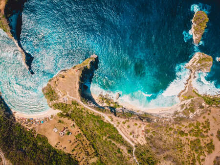 Aerial view of beach with blue ocean in Nusa Penida. Drone viewの写真素材