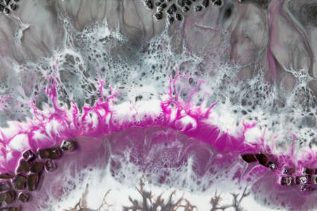 Resin art with bright colors and glass. Epoxy background