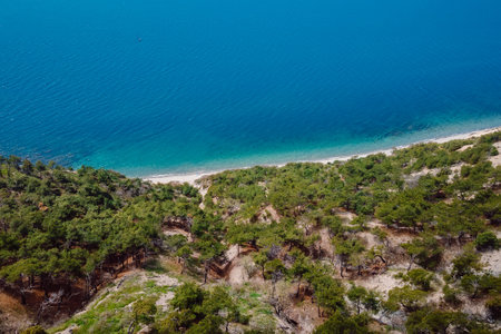 Aerial view of coastline with blue sea and highest cliff. Summer day on Black sea in Anapa
