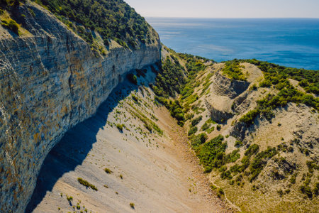 Aerial view of coastline with canyon and cliffs in Anapaの写真素材