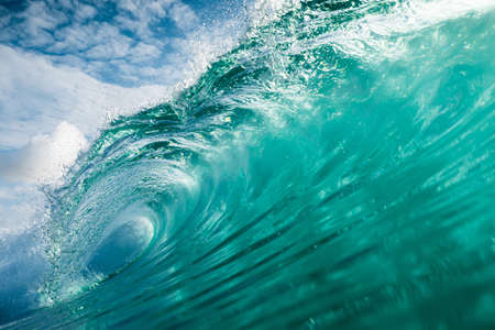 Ideal wave with transparent water in the Atlantic Ocean. Glassy turquoise wave sunny day