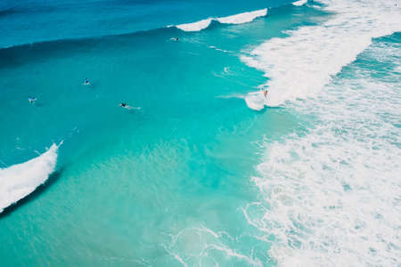 Beach with scenic coastline and ocean with waves at sunrise in Brazil. Aerial viewの写真素材
