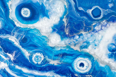 Epoxy resin art. Resin art with blue and white colors. Abstract composition for your design.の写真素材