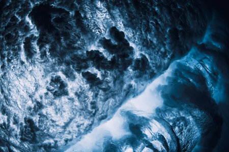 Wave textures with vortex underwater in transparent sea water. Swell in oceanの写真素材