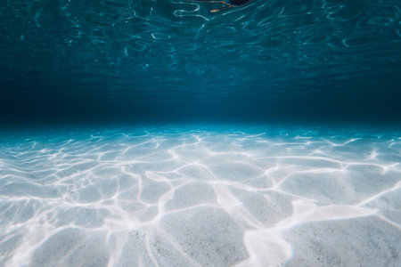 Tropical blue ocean with sand bottom on Bahamas islands. Panoramic underwater backgroundの写真素材